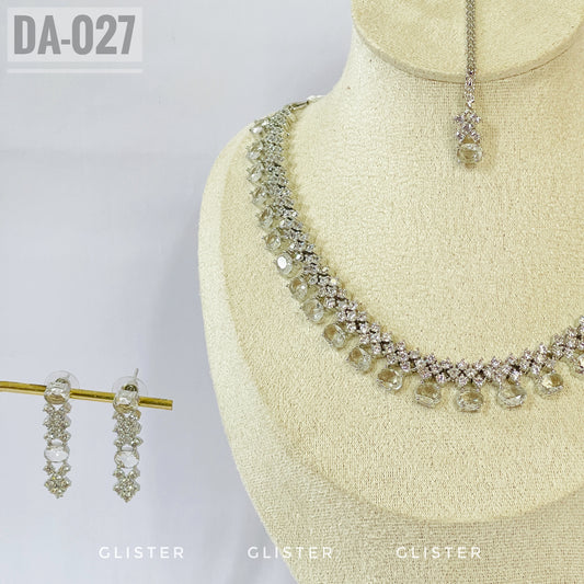 Silver-tone clear teardrop necklace and earrings close-up with a matching forehead ornament