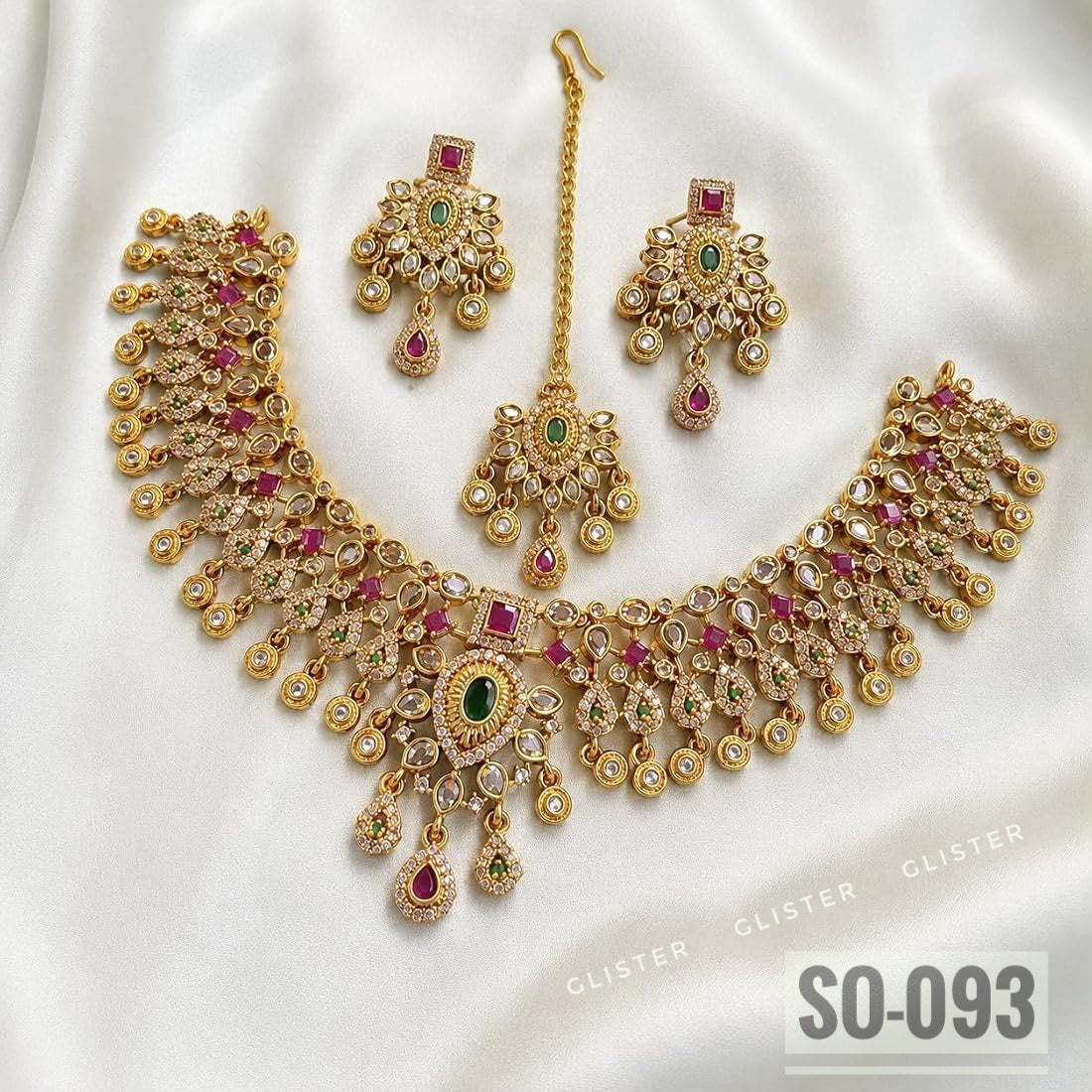 Gold-tone wide choker with colored accents, bead fringe, earrings and a forehead ornament